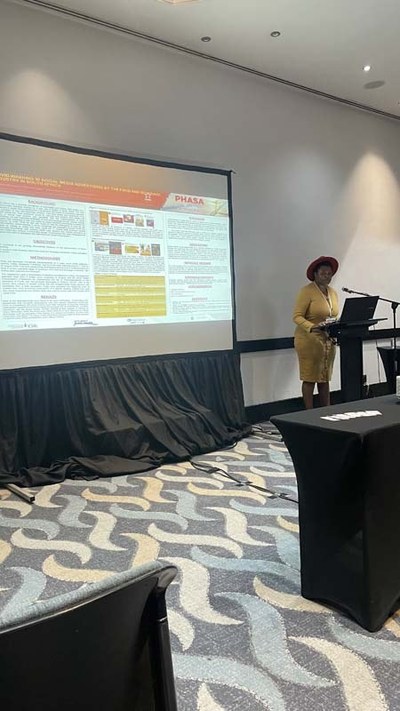 Mikateko Mafuyeka presented on COVID-washing in social media advertising by the food and beverage industry in South Africa at PHASA2022
